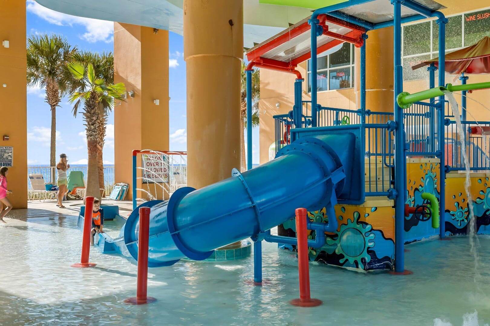 Pool with slide and play area
