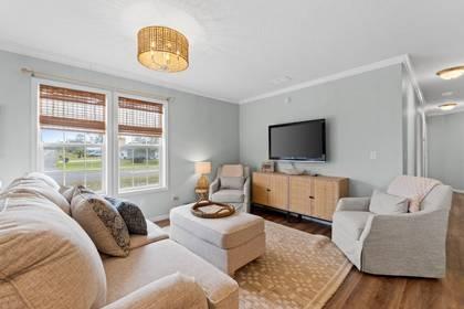 Living room with couches and tv