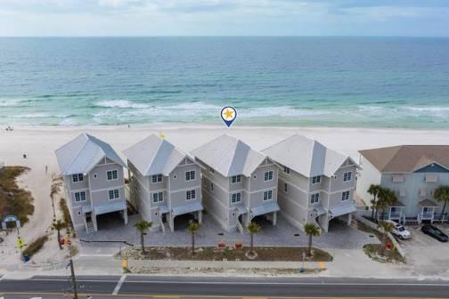 aerial view of homes on the beach